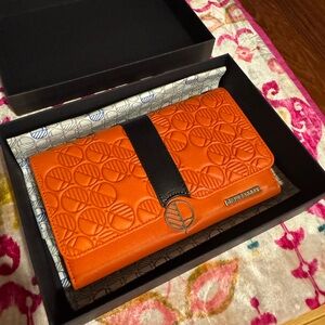 Brand new in box Drew Lennox leather clutch